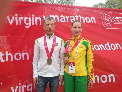 Nuotraukoje - maratonininkė Au&scaron;ra Garunk&scaron;nytė su treneriu Linu Balsiu